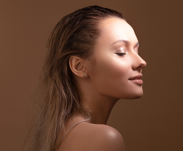 woman smiling looking down